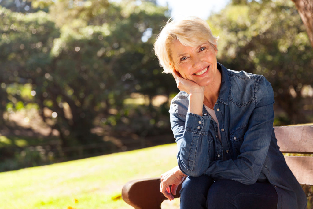 cheerful mid age woman looking at the camera